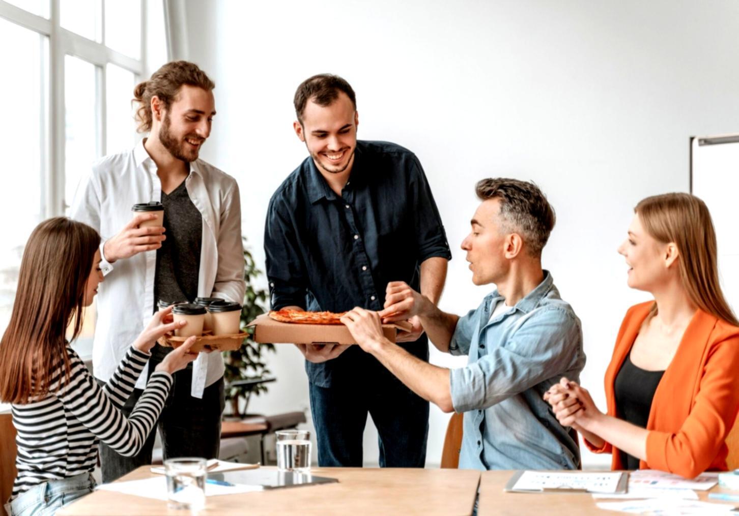 Students collaborating on financial analysis during capital budgeting workshop